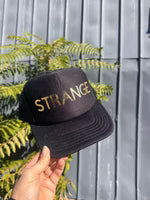 STRANGE trucker hat
